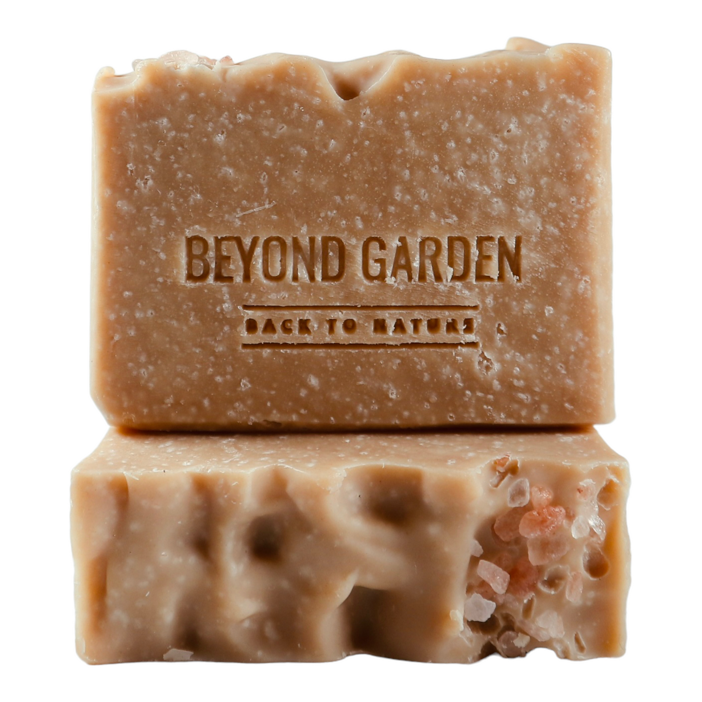 View of a Himalayan salt soap bar with Beyond Garden elegantly stamped on the surface, showcasing its natural texture and handmade craftsmanship.
